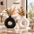 Black and white ring-shaped decorative vases